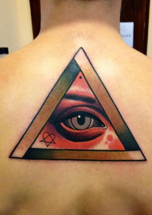 Lovely Triangle Eye Colored Tattoo On Upper Back