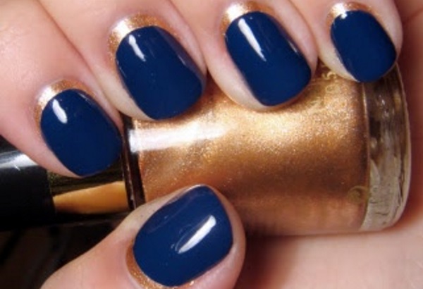 Navy Blue Nails With Golden Reverse French Tip Design