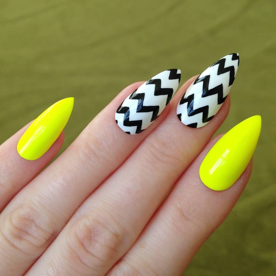 Neon Yellow Matte Stiletto Nail Art With Black And White Chevron Design Idea