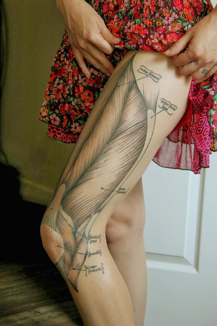 Nice 3D Grey Muscles Tattoo On Left Thigh