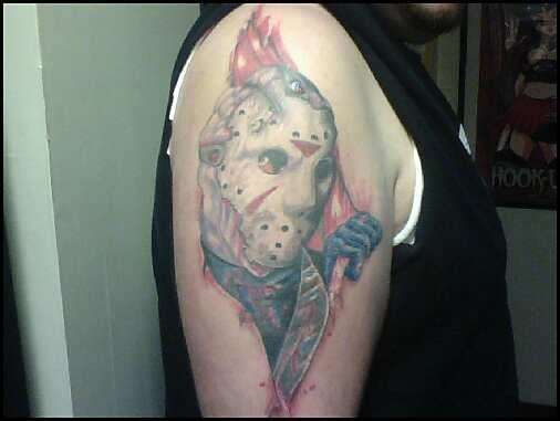 Nice 3D Jason With Knife Tattoo On Right Shoulder
