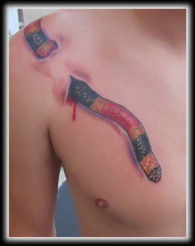 Nice 3D Reptile Earthworm Tattoo On Chest