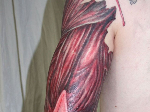 Nice Arm Muscles Tattoo
