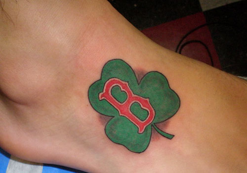 Nice B Letter On Shamrock Leaf Tattoo On Foot