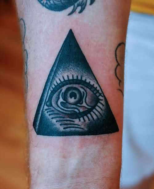 Nice Black Ink Triangle Eye Tattoo On Wrist