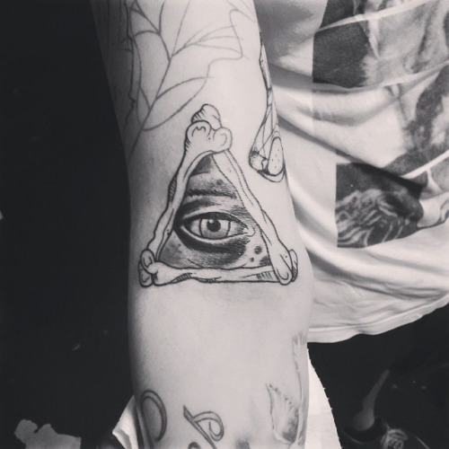 Nice Bones Made Triangle Eye Tattoo On Forearm