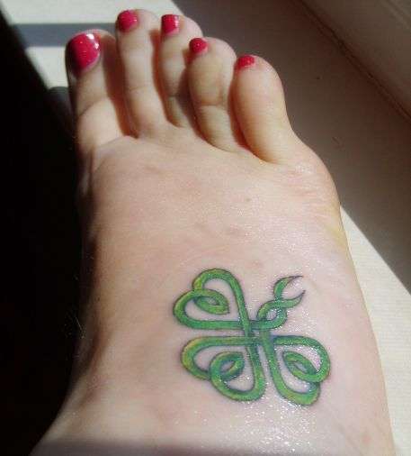 Nice Celtic Style Shamrock Leaf Tattoo On Foot