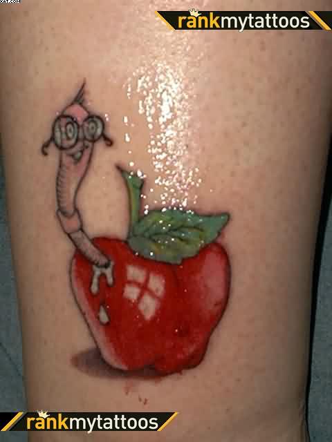 Nice Cute Worm Wearing Spectacles In Rotten Apple Tattoo