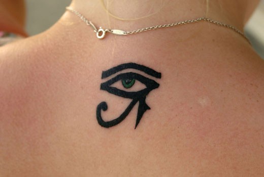 Nice Dark Ink Horus Eye Tattoo On Upper Back