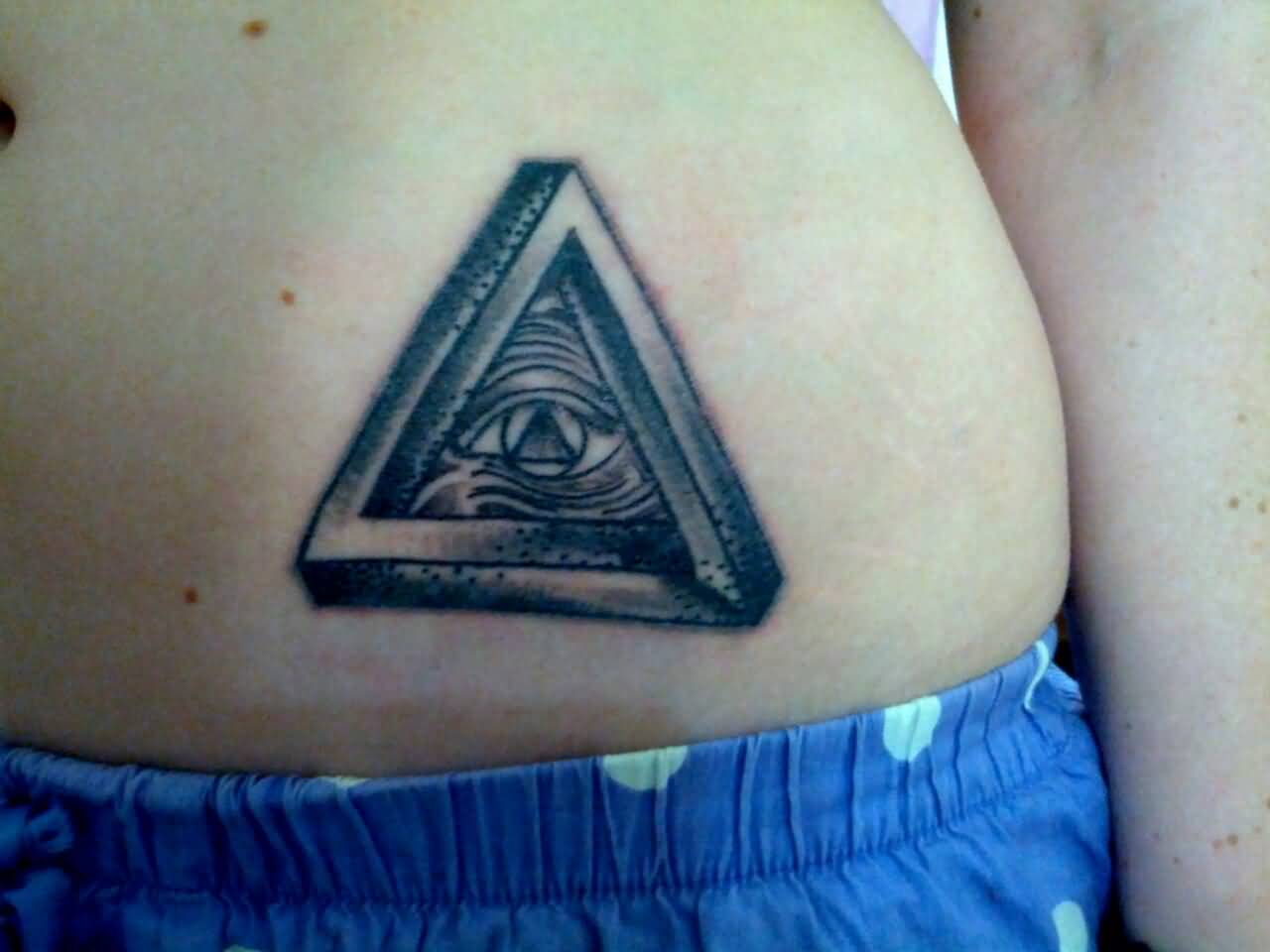 Nice Dark Ink Triangle Eye Tattoo On Hip
