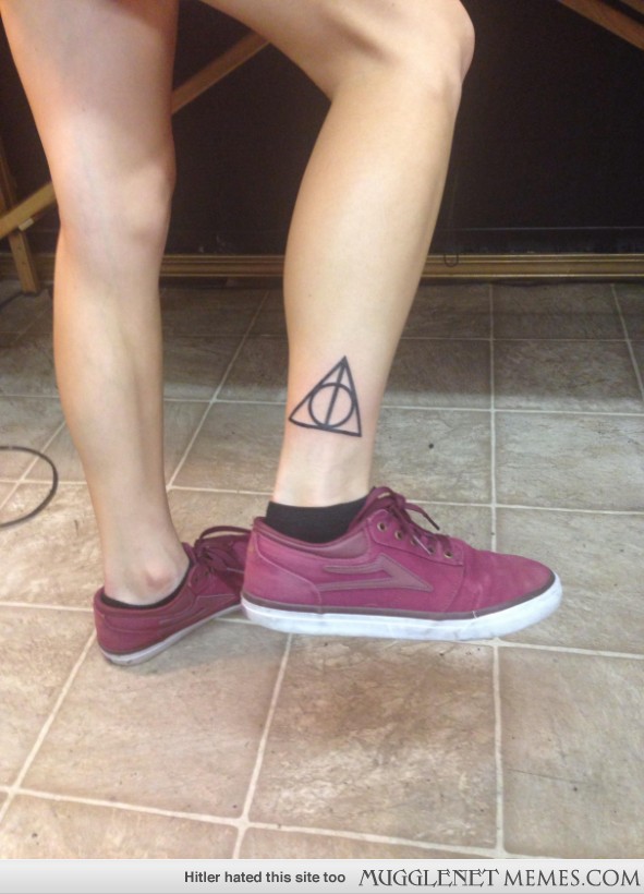 Nice Deathly Hallows Tattoo On Right Ankle