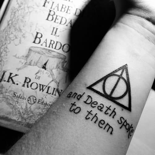 Nice Deathly Hallows With Lettering Wrist Tattoo