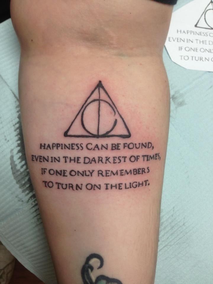 Nice Deathly Hallows With Quote Tattoo On Forearm