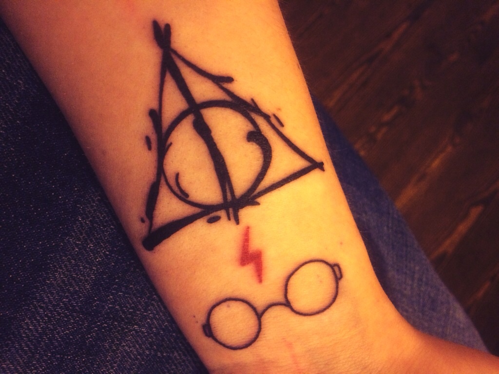 Nice Deathly Hallows With Spectacles Tattoo On Wrist
