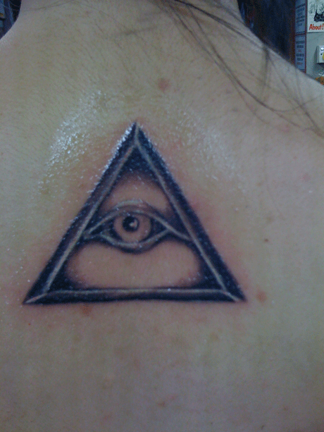 Nice Grey And Black Triangle Eye Tattoo On Upper Back