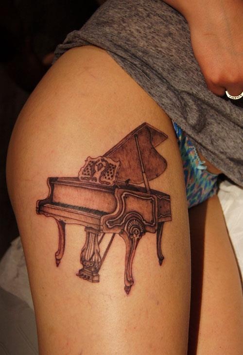 Nice Grey Grand Piano Tattoo On Left Shoulder