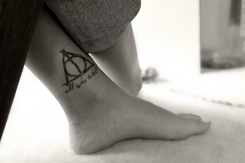 Nice Grey Hallows With Lettering Ankle Tattoo