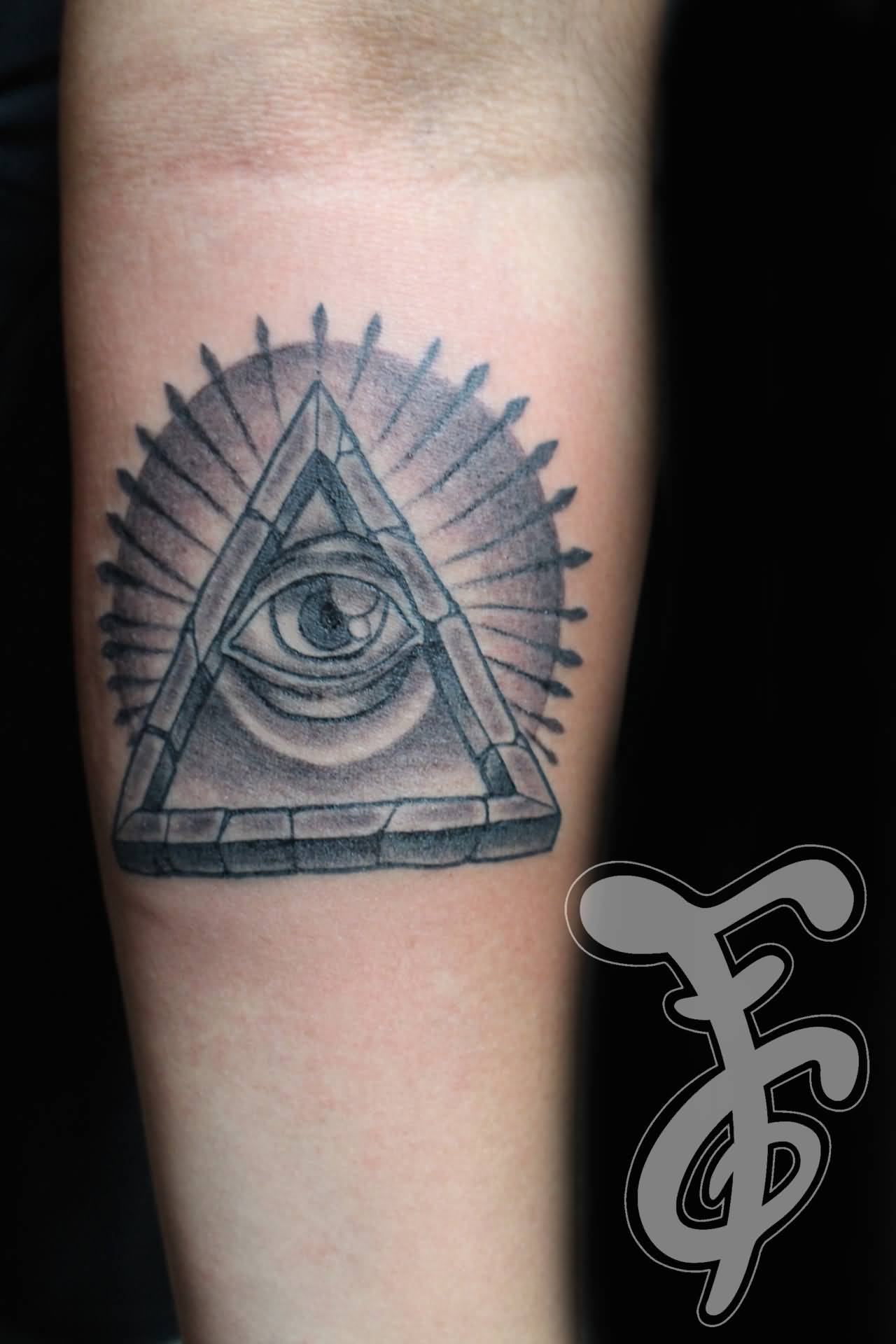 Nice Grey Triangle Eye Tattoo On Forearm
