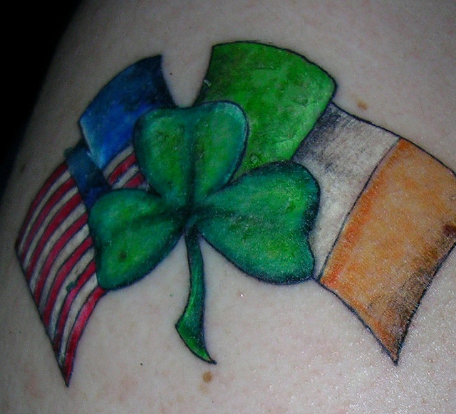 Nice Ireland And American Flag With Shamrock Logo Tattoo