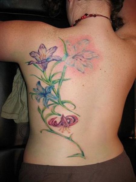 Nice Iris Flowers Tattoo On Left Back
