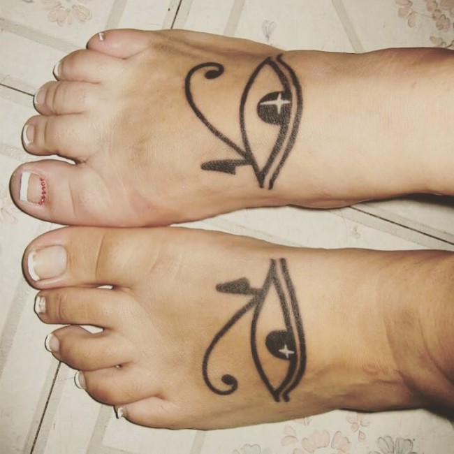 Nice Little Shinning Star In Horus Eye Matching Tattoos On Both Foots