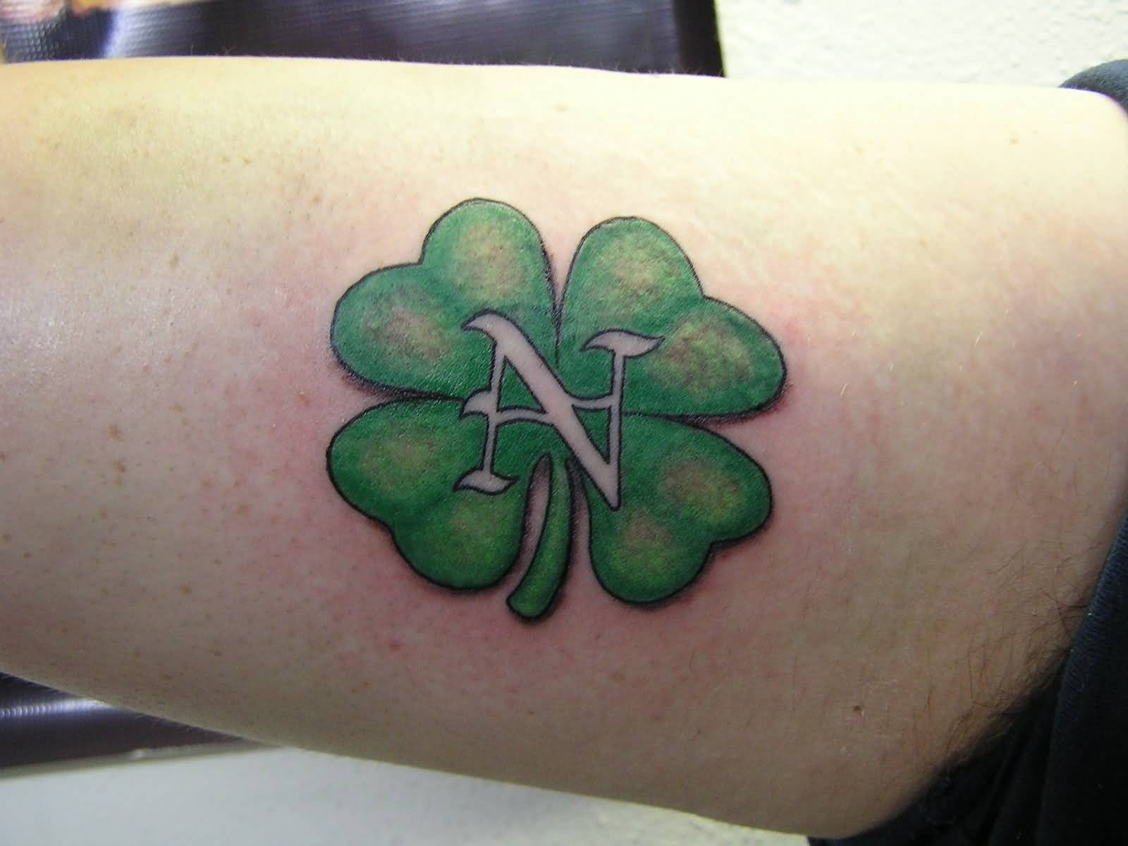Nice N Letter On Four Leaf Shamrock Tattoo