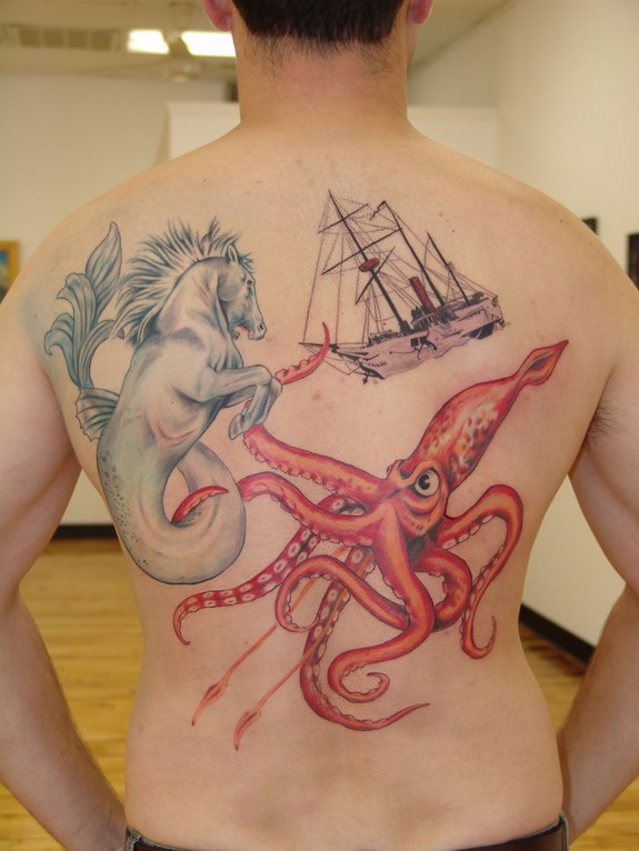 Nice Octopus And Seahorse With Ship Back Tattoo