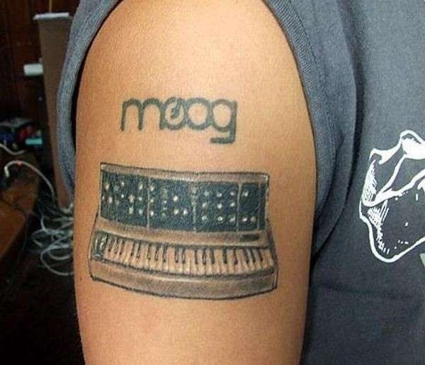 Nice Piano Keyboard Tattoo On Right Shoulder