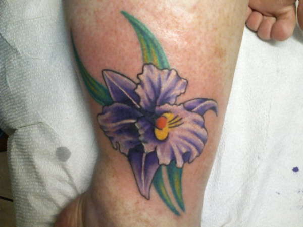 Nice Purple Iris Flower Tattoo On Ankle