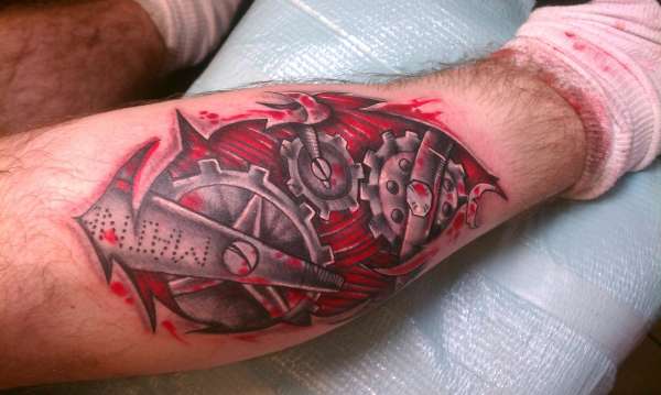 Nice Red And Grey Mechanical Gears Tattoo On Leg