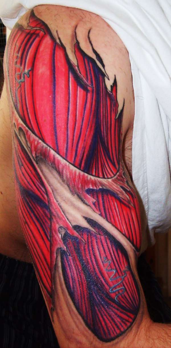 Nice Red Ink Muscles Ripped Skin Tattoo On Half Sleeve