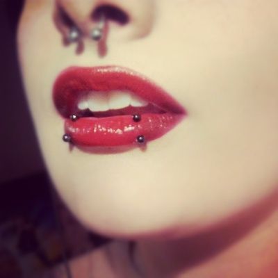 Nice Septum And Snake Bites Piercing For Young Girls