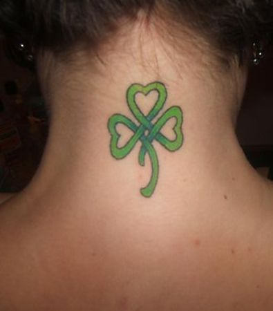 Nice Shamrock In Celtic Style Tattoo On Back Neck