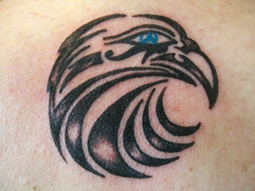 Nice Tribal Eagle Head With Horus Eye Tattoo