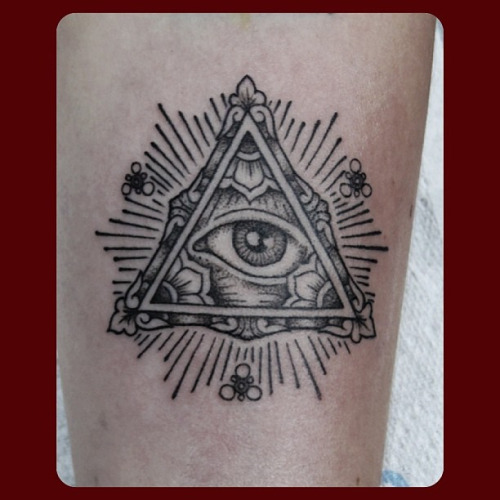 Nicely Designed Grey Triangle Eye Tattoo