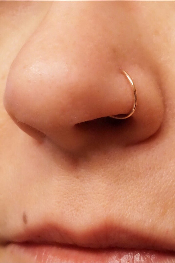 Nostril Piercing Closeup Image