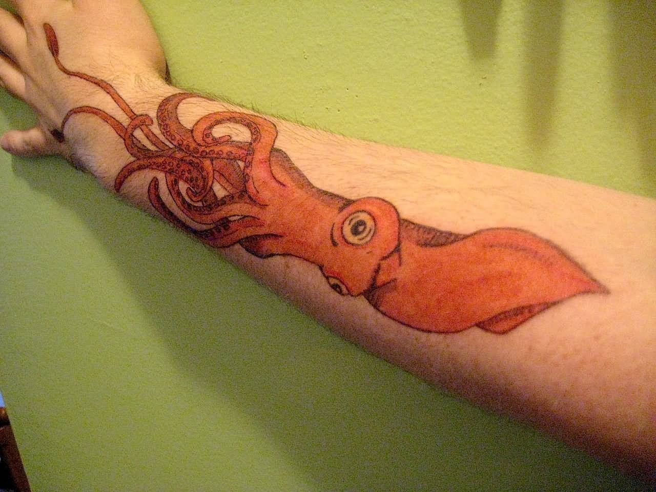 Orange Color Sea Creature Squid Tattoo On Arm Sleeve