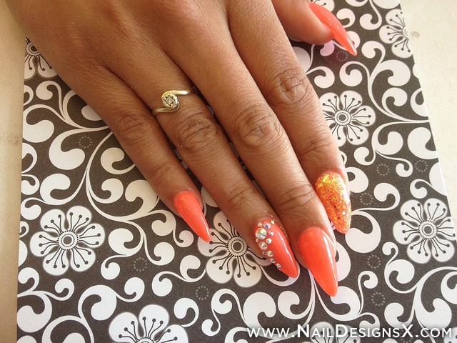 Orange Stiletto Nail Art With Pearls Design Idea