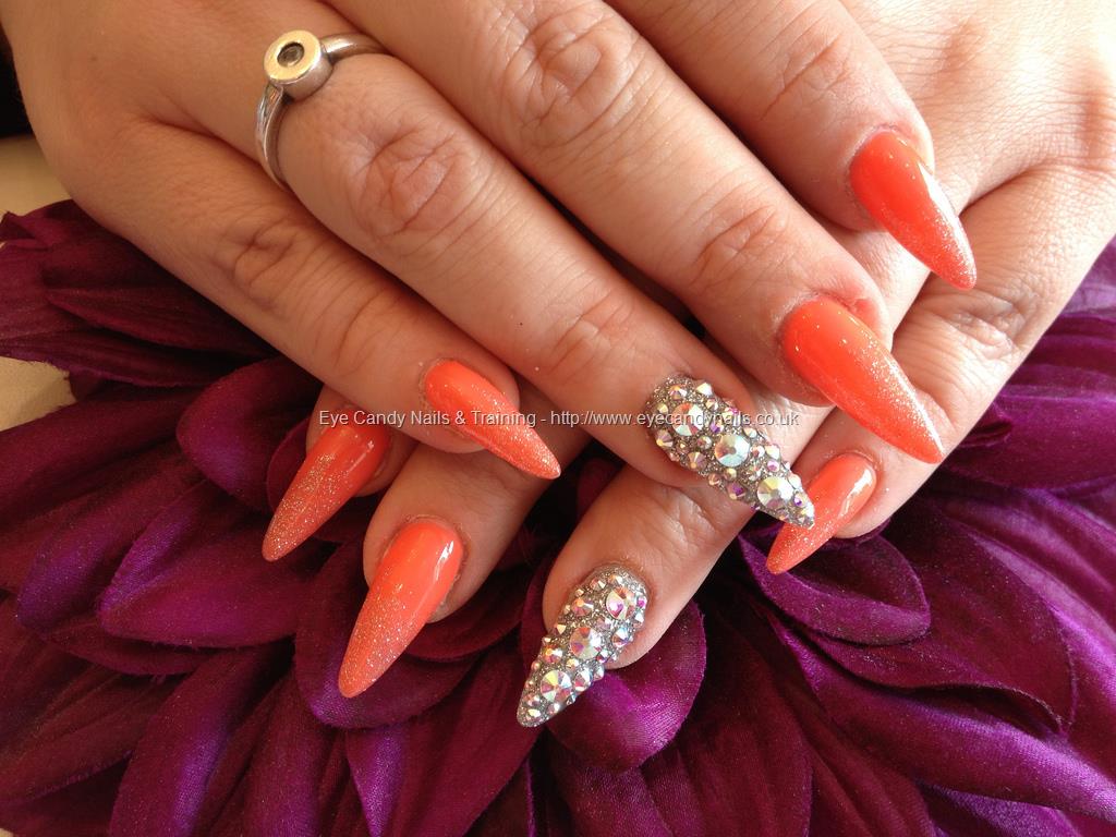 Orange Stiletto Nails With Crystals Design