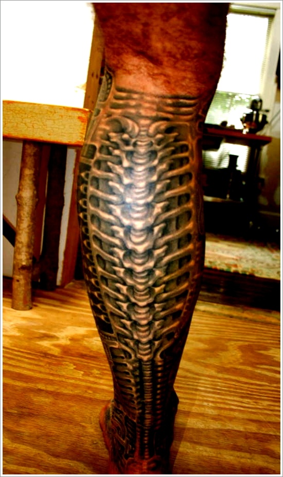 Outstanding Grey Biomechanical Tattoo On Back Leg