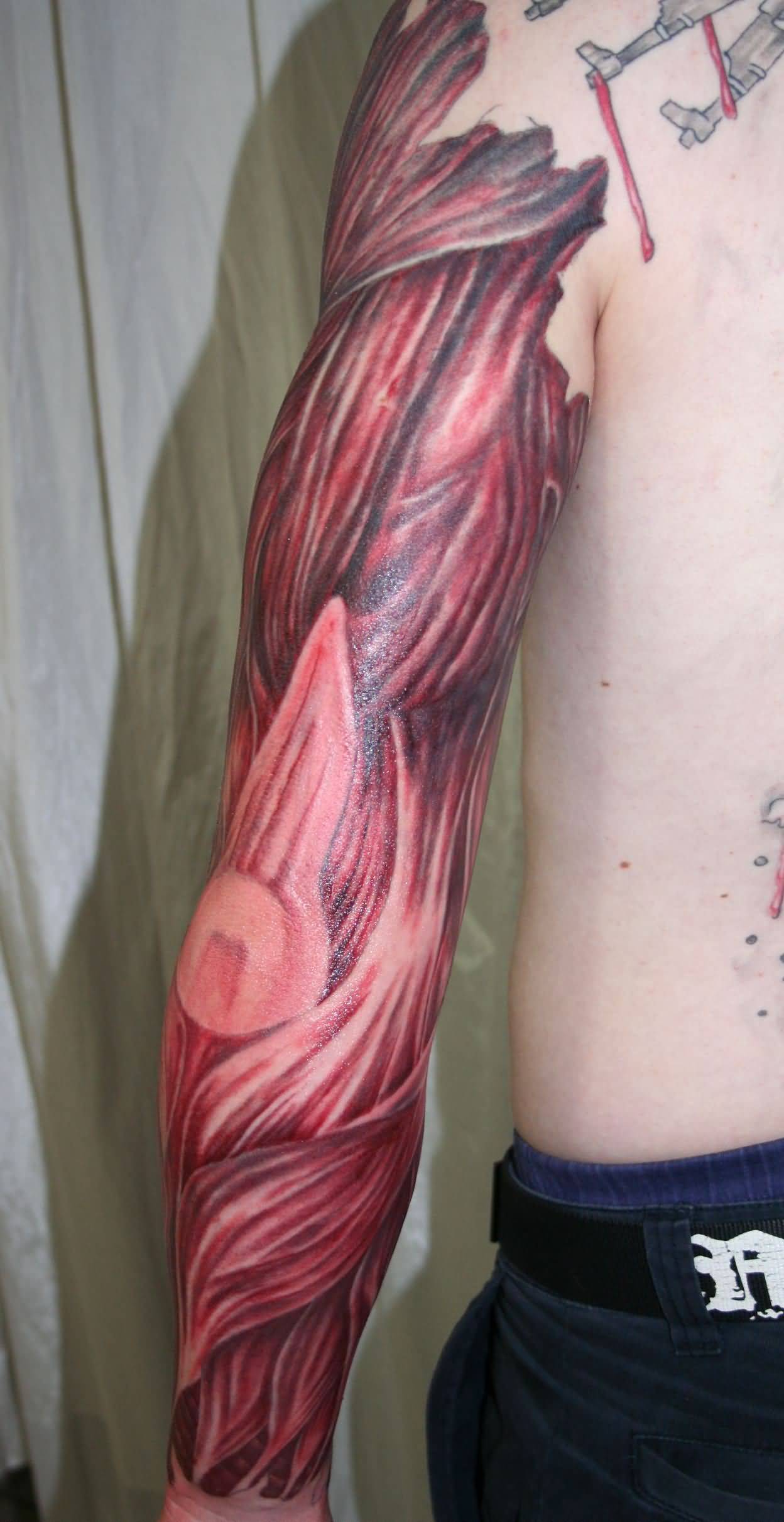 Outstanding Muscles Ripped Skin Full Sleeve Tattoo For Men