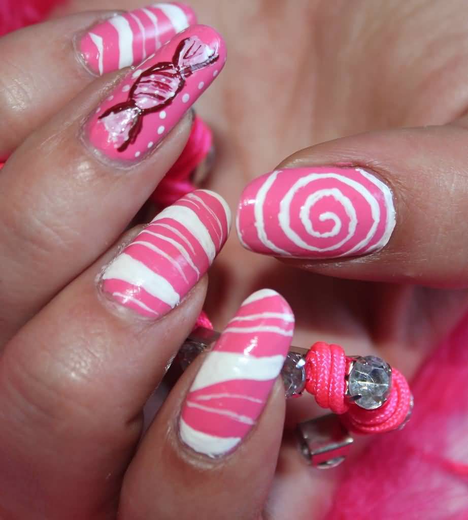 Pink And White Spiral Nail Art With Candy Picture