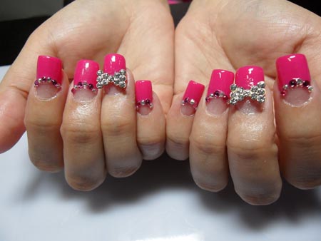 Pink French Tip Nails With 3D Metallic Bow Design Nail Art