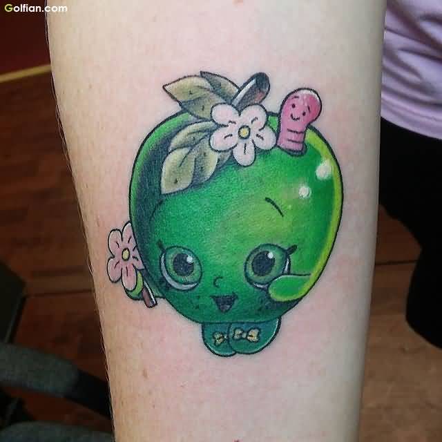 Pink Worm And Cute Green Apple Tattoo