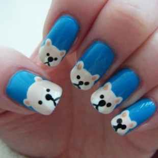 Polar Bear Cartoon Nail Art On Blue Nails