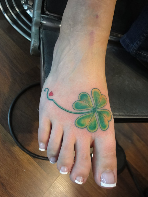 Pretty Four Leaf Shamrock Tattoo On Foot