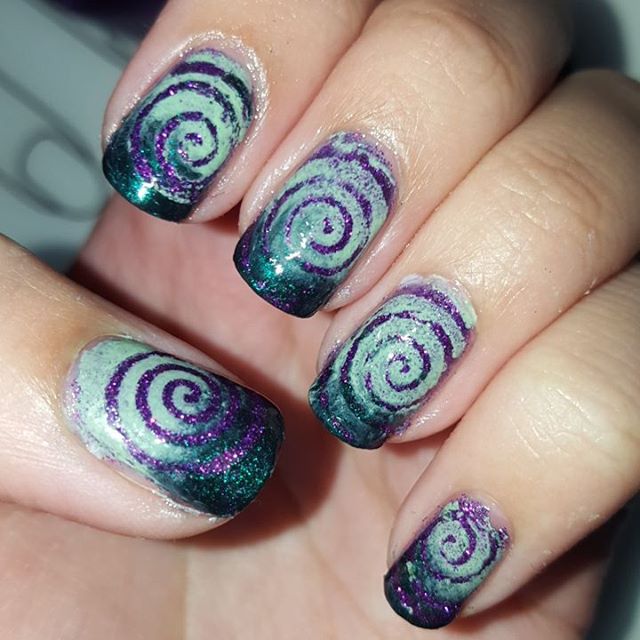 Purple Glitter Spiral Nail Art