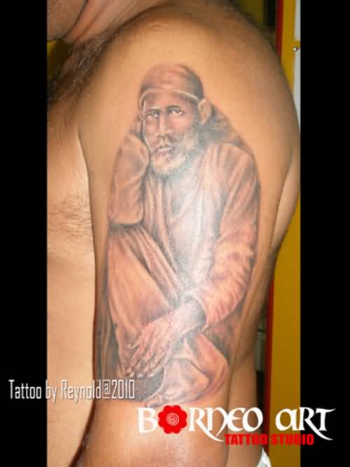 Realistic Colored Sai Baba Tattoo On Left Half Sleeve
