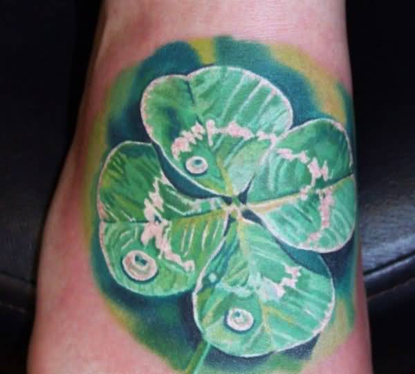 Realistic Four Leaf Shamrock With Water Tattoo