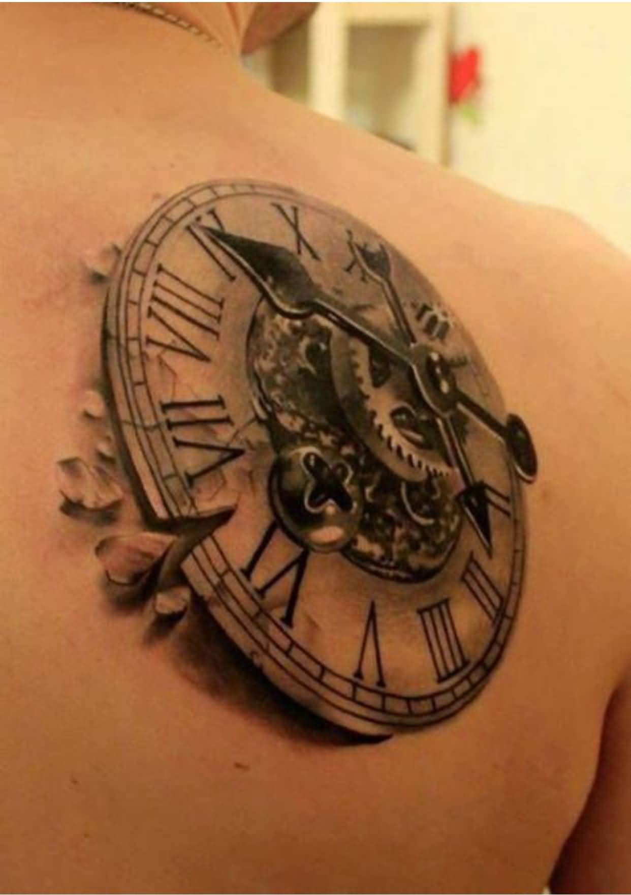 Realistic Grey Mechanical Watch Tattoo On Left Back Shoulder